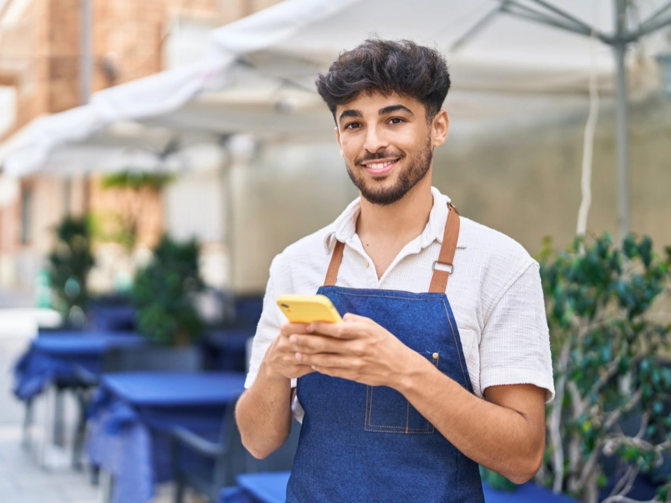 iPhone-Handgeräte im Service mit Gastrozack